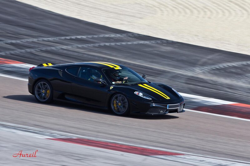 Black Ferrari on Track — Dynamic