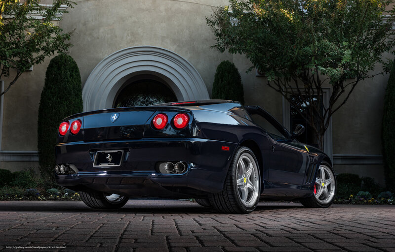 Black Ferrari parked outside