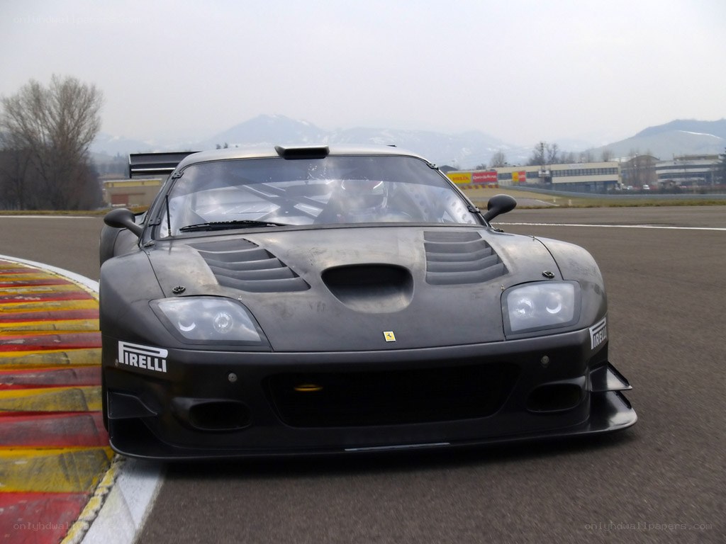 Black Ferrari race car on track