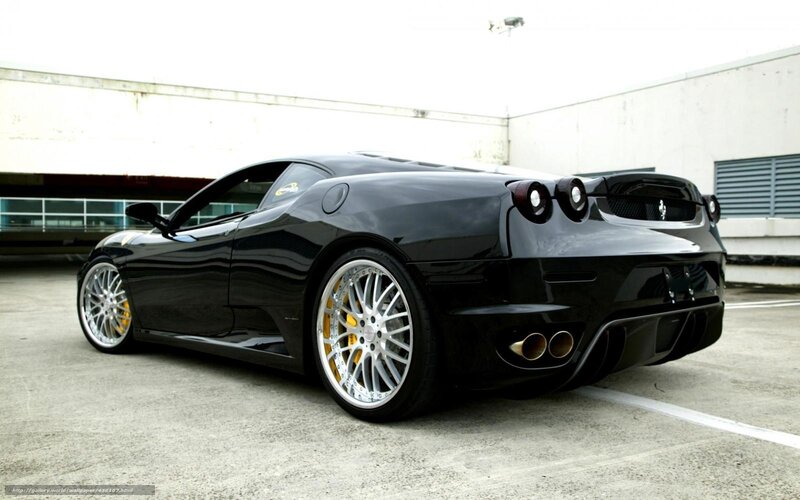 Black Ferrari Sports Car — Calm, Photograph, Wheels