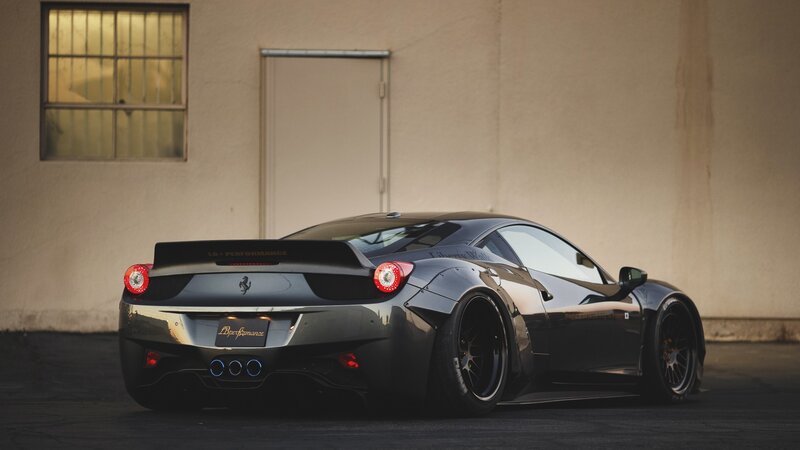 Black Ferrari Sports Car — Dramatic, Sunset, Photograph