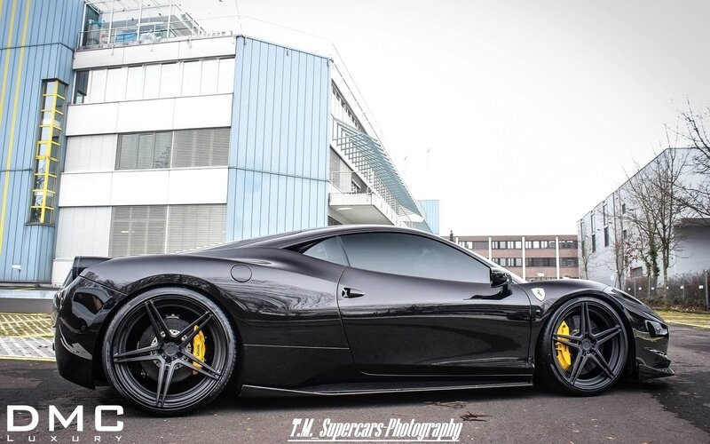 Black Ferrari Sports Car — Dramatic, Winter, Photograph