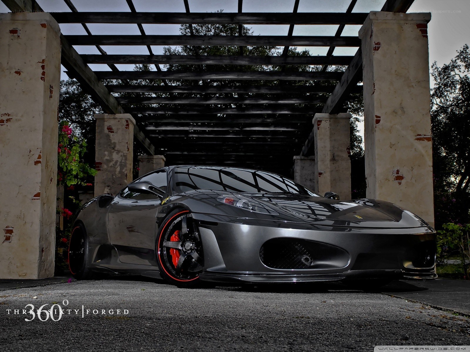 Black Ferrari under pergola