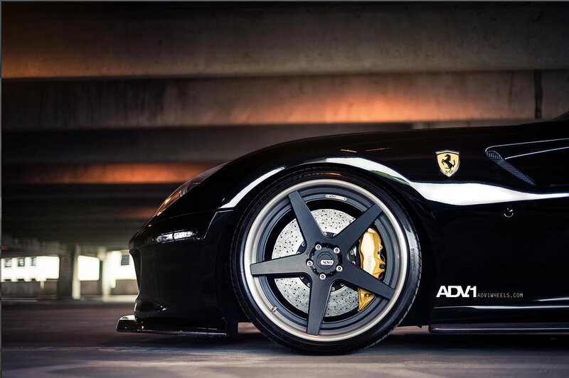 black ferrari with custom wheels