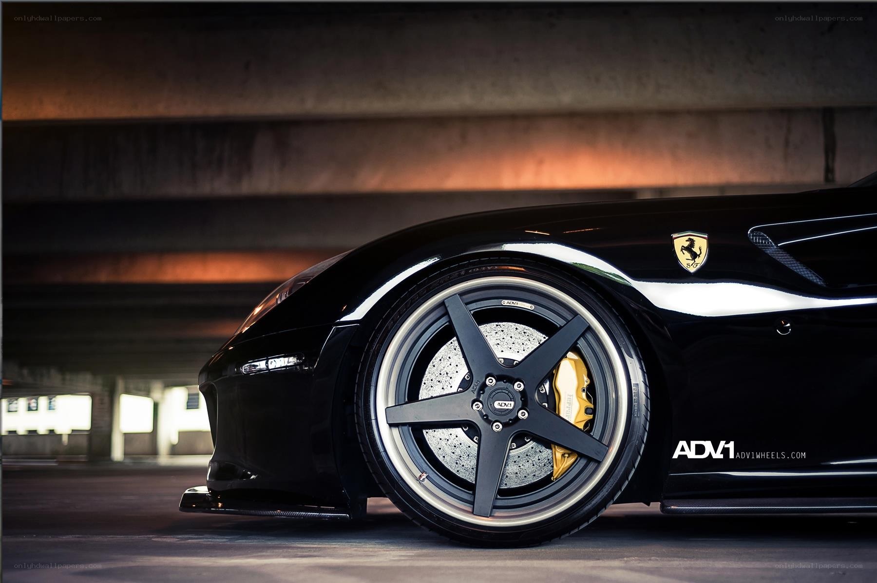 black ferrari with custom wheels