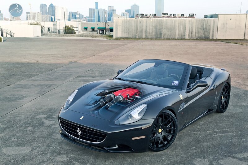 Black Ferrari with exposed engine