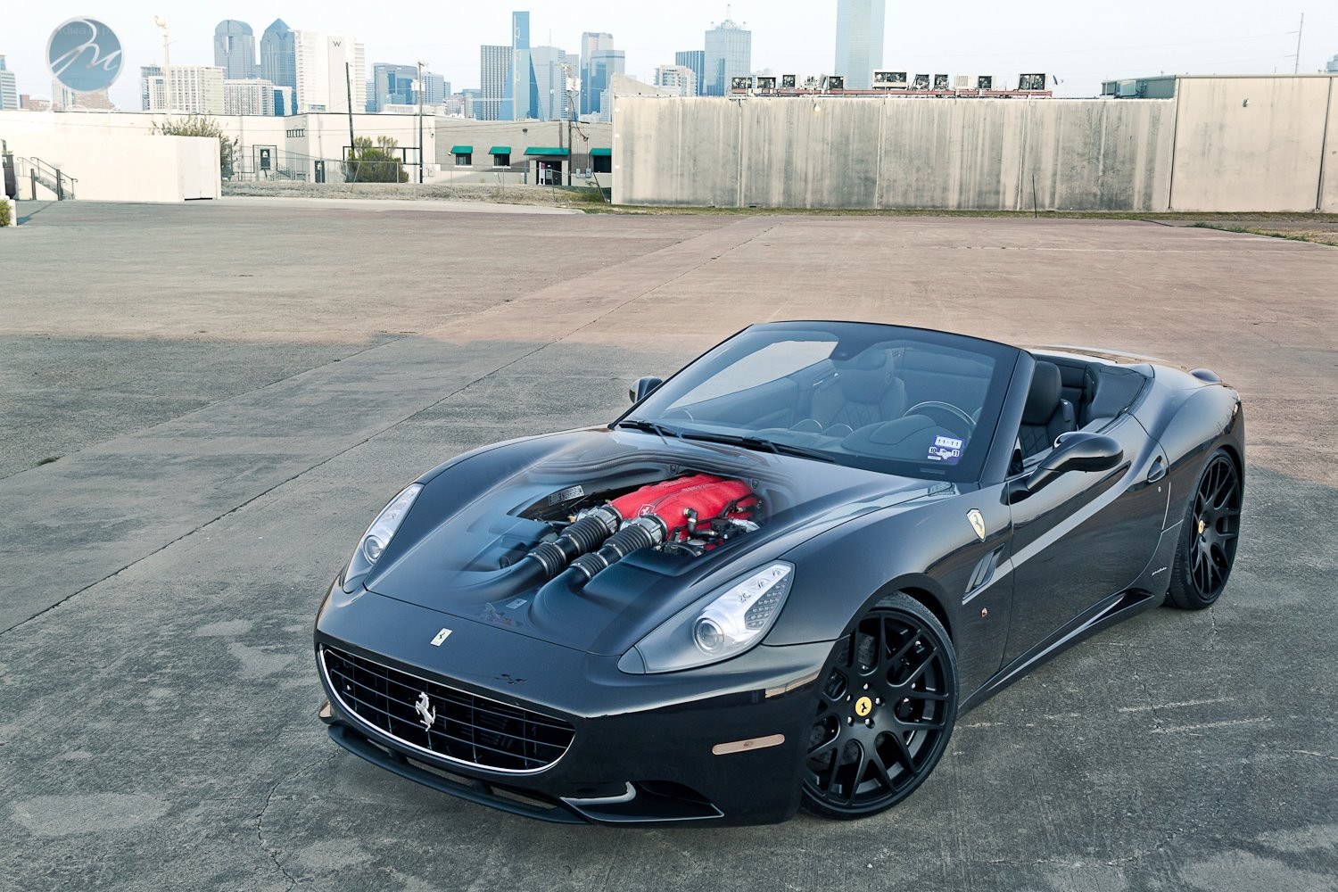 Black Ferrari with exposed engine