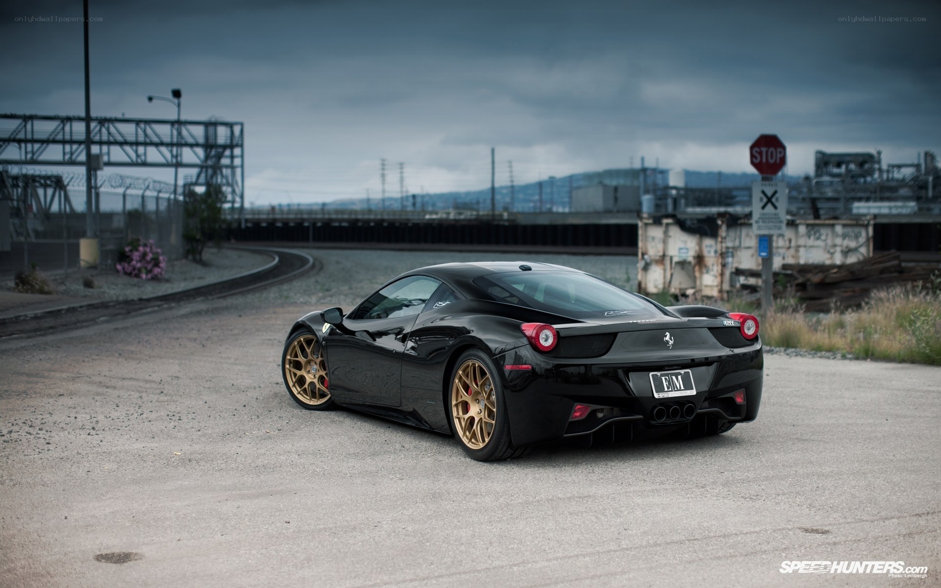 Black Ferrari with gold wheels