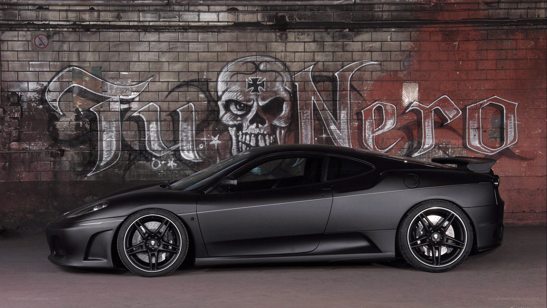 Black Ferrari with graffiti art