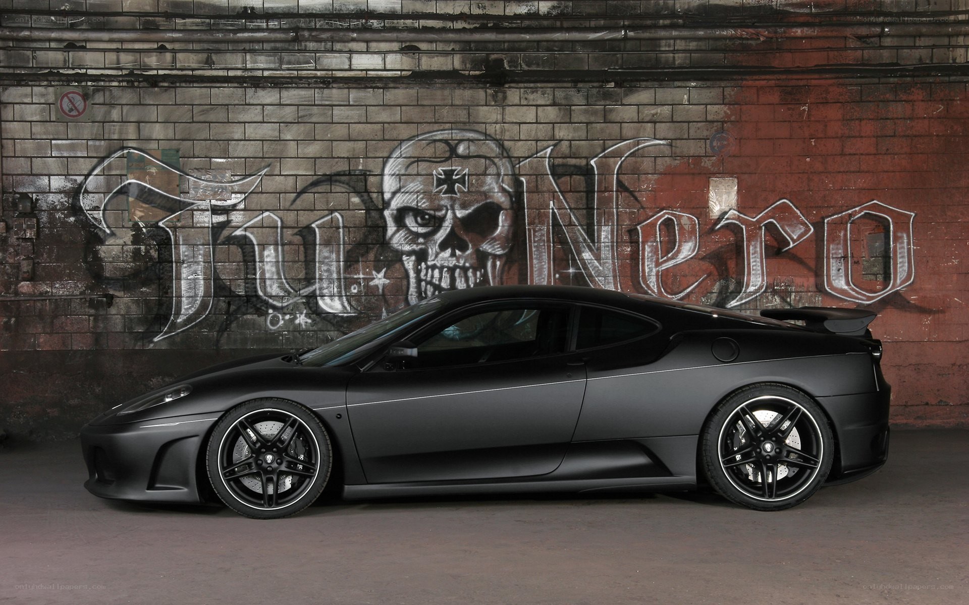 Black Ferrari with graffiti background