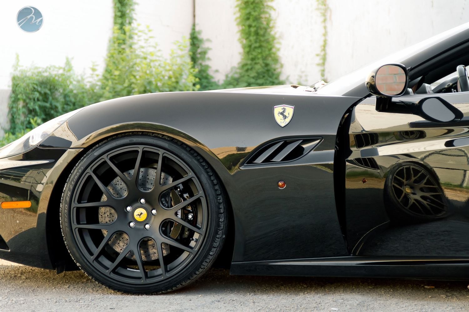 Black Ferrari with open door