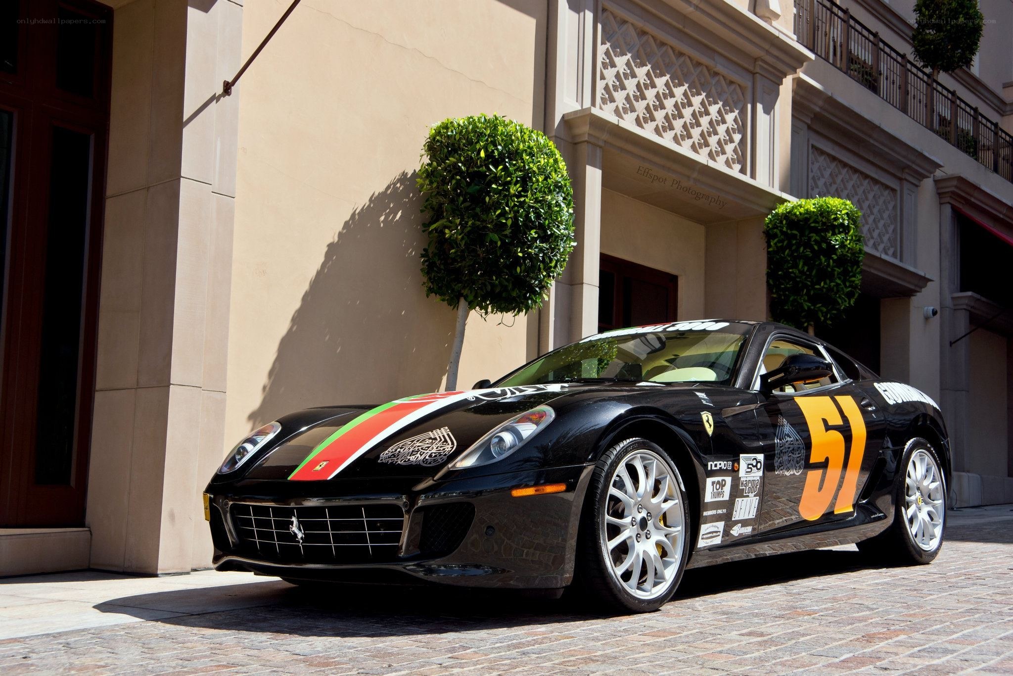 Black Ferrari with racing decals
