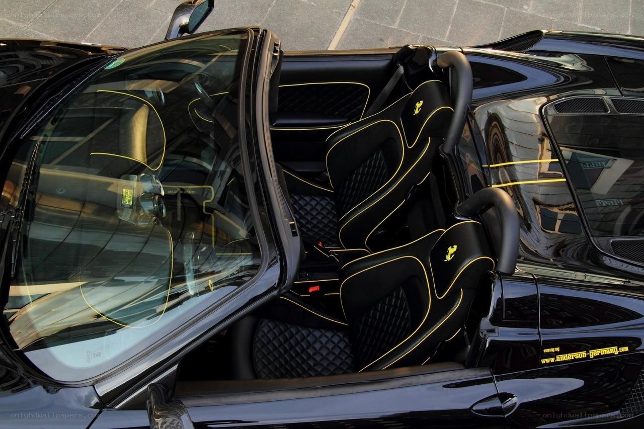 Black Ferrari with yellow stitching