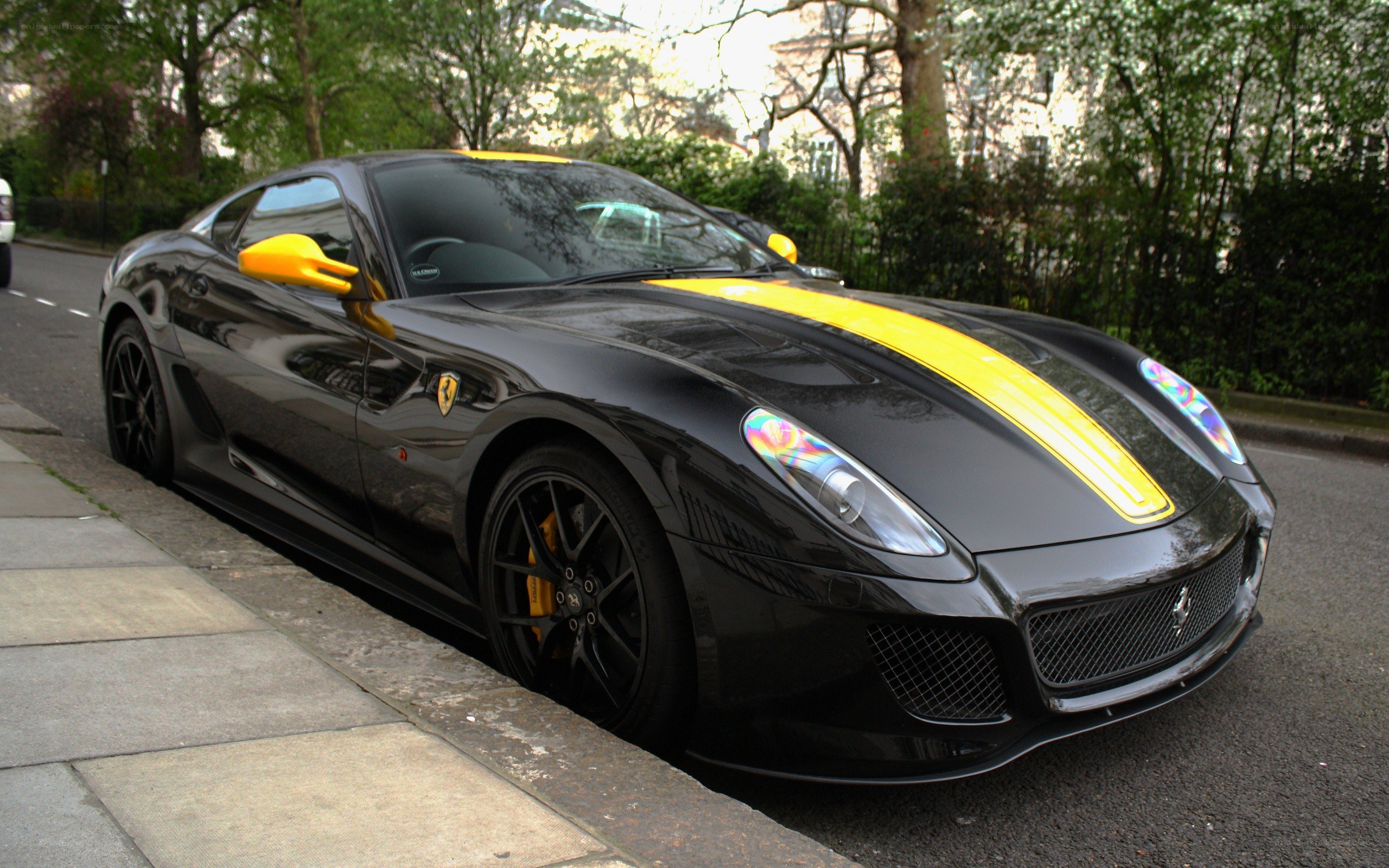 Black Ferrari with yellow stripes