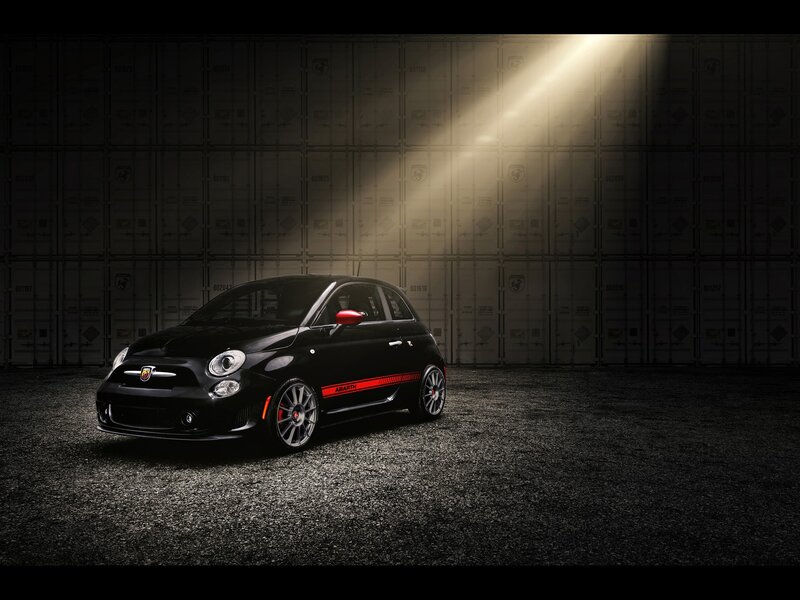 Black Fiat Abarth in spotlight