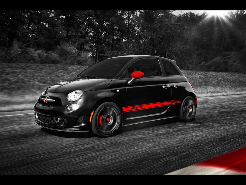 Black Fiat Abarth on a road