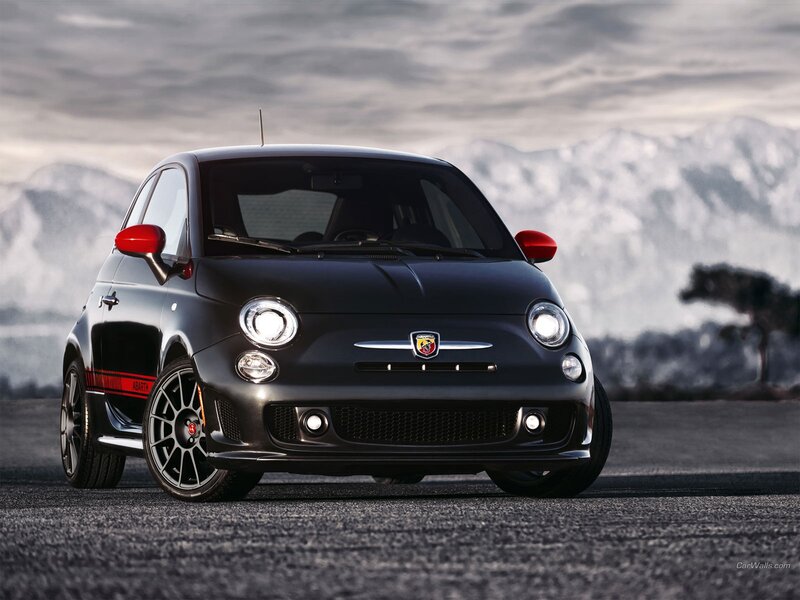 Black Fiat Abarth on mountain road