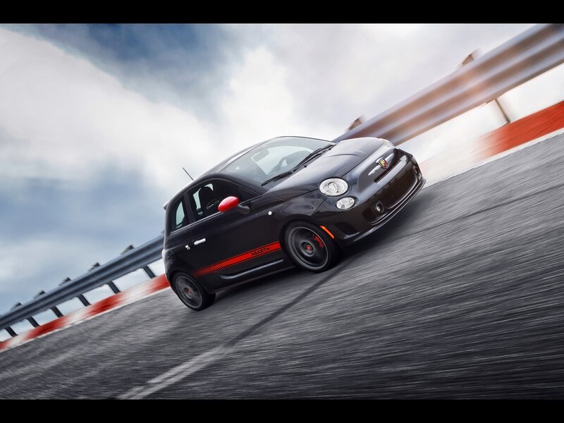 Black Fiat Abarth on racetrack