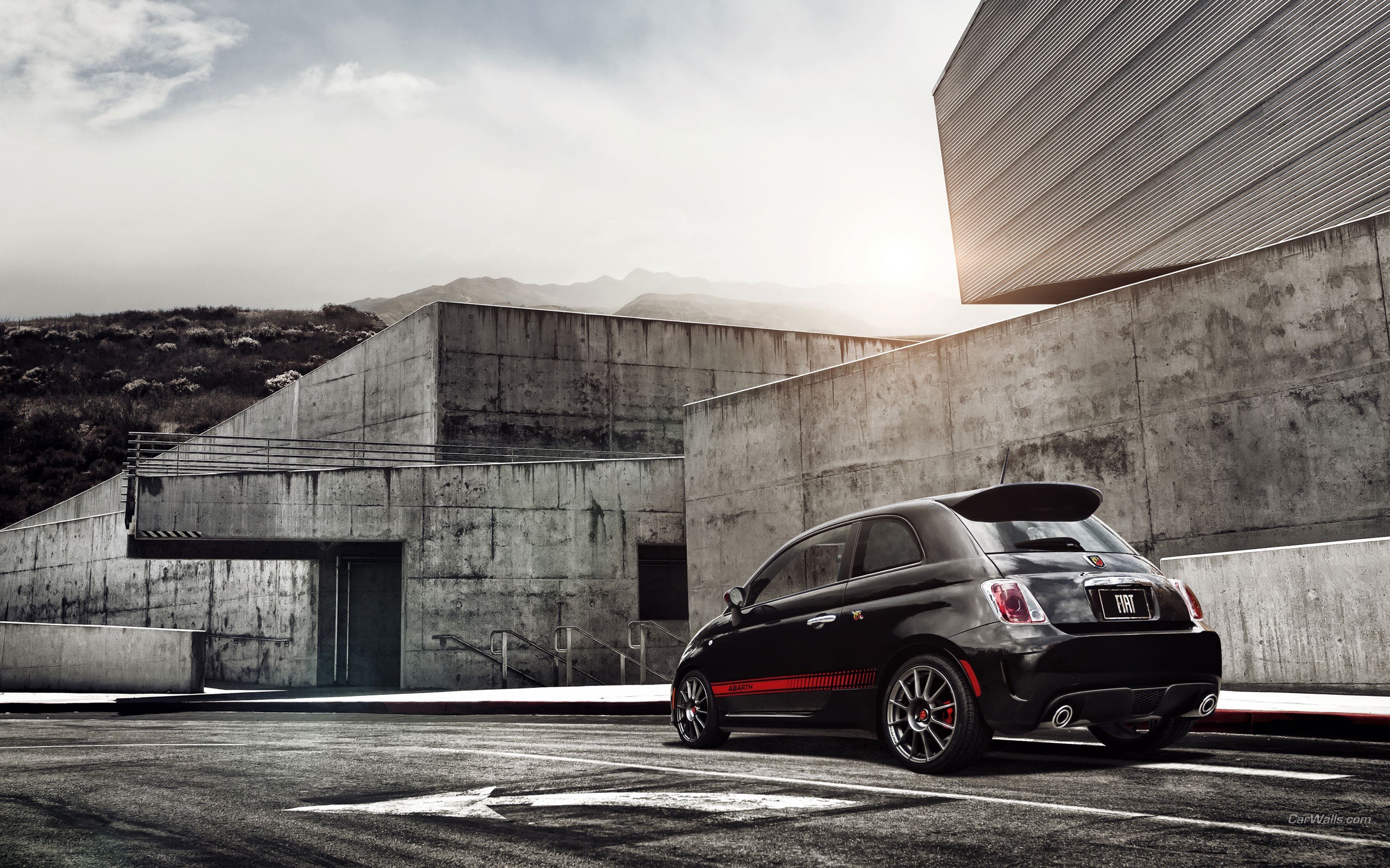Black Fiat Abarth parked outside