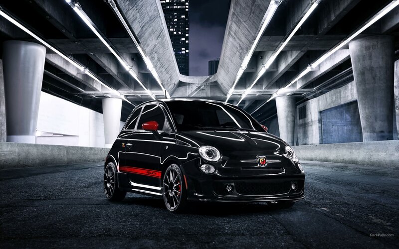 Black Fiat Abarth under highway