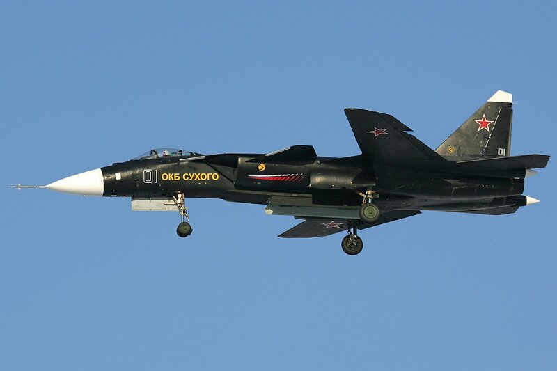 Black Fighter Jet in Flight — Blue