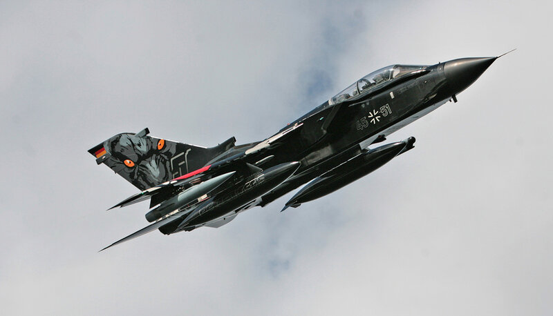 Black Fighter Jet in Flight — Dynamic, Photograph, Clouds