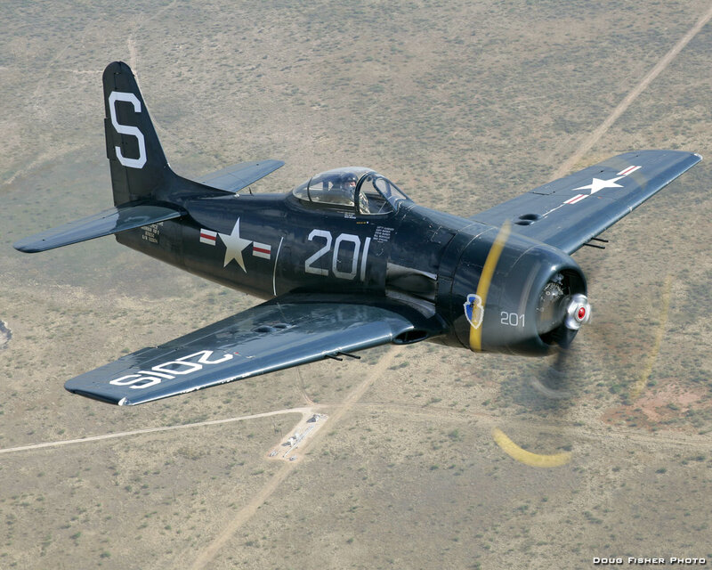 Black fighter plane in flight