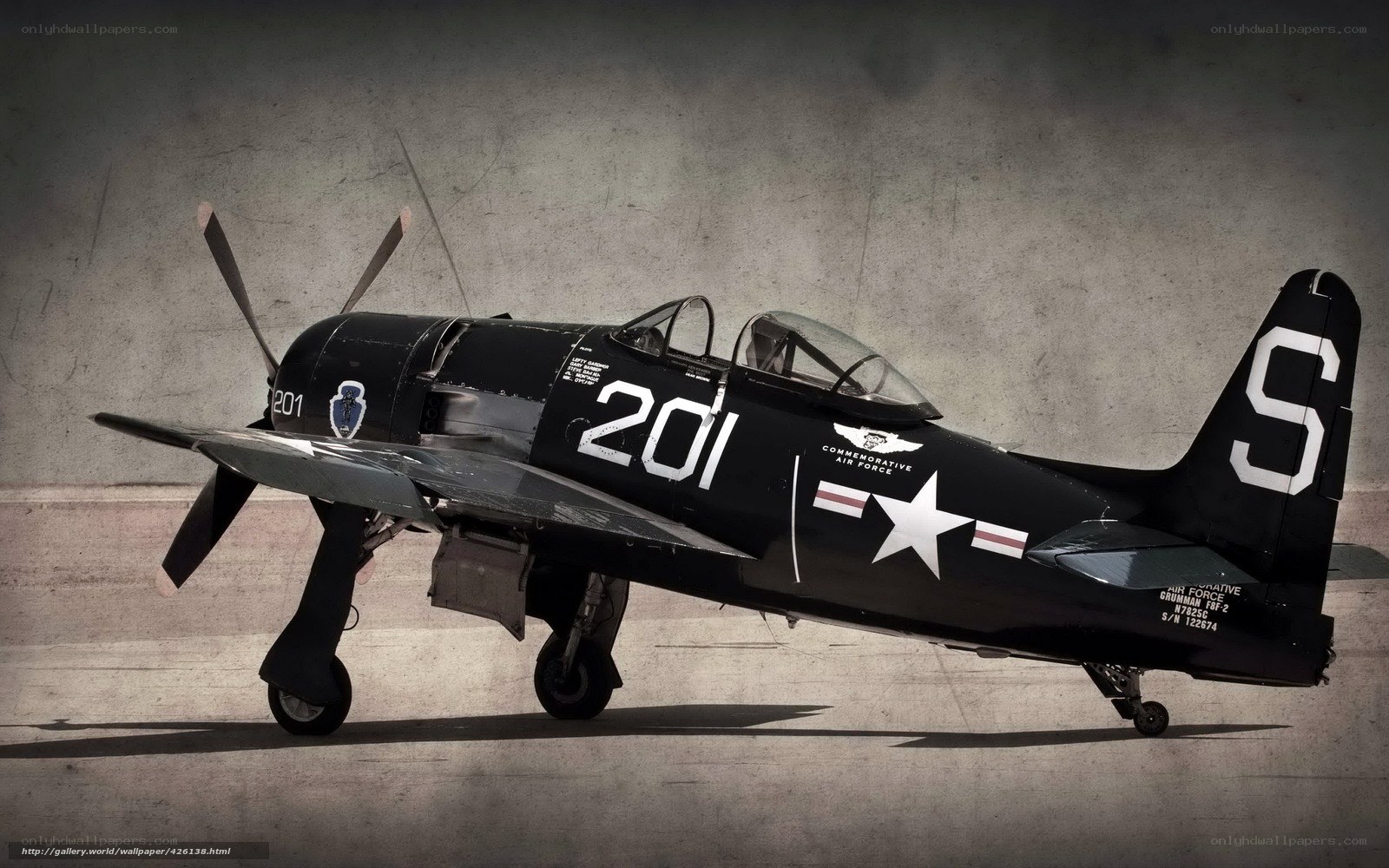 Black fighter plane on tarmac