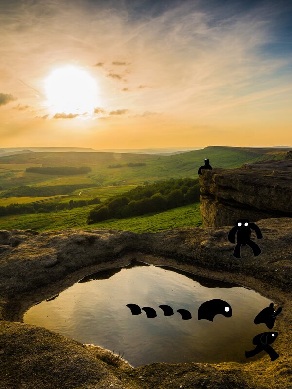 Black Figures on Cliff