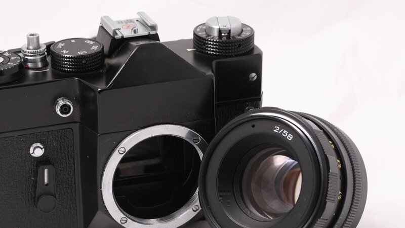 black film camera with lens