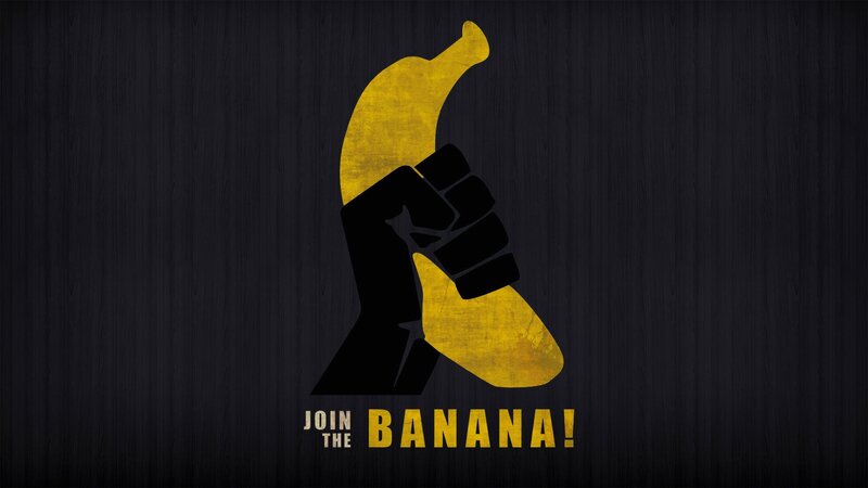 Black Fist Holding Banana