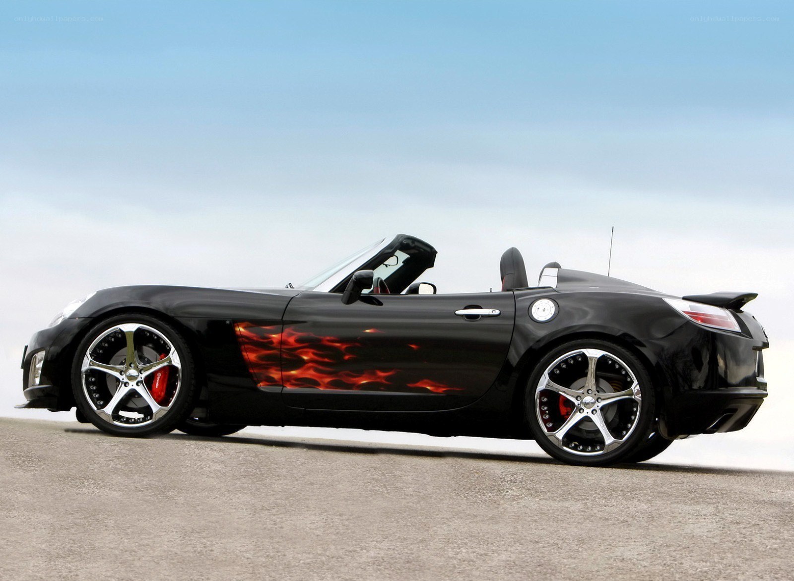 black flame car on road