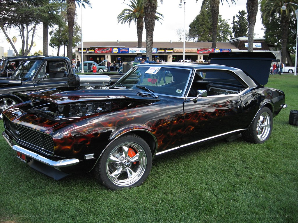 black flame-painted muscle car