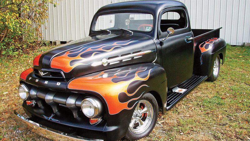 Black flame-painted vintage Ford truck