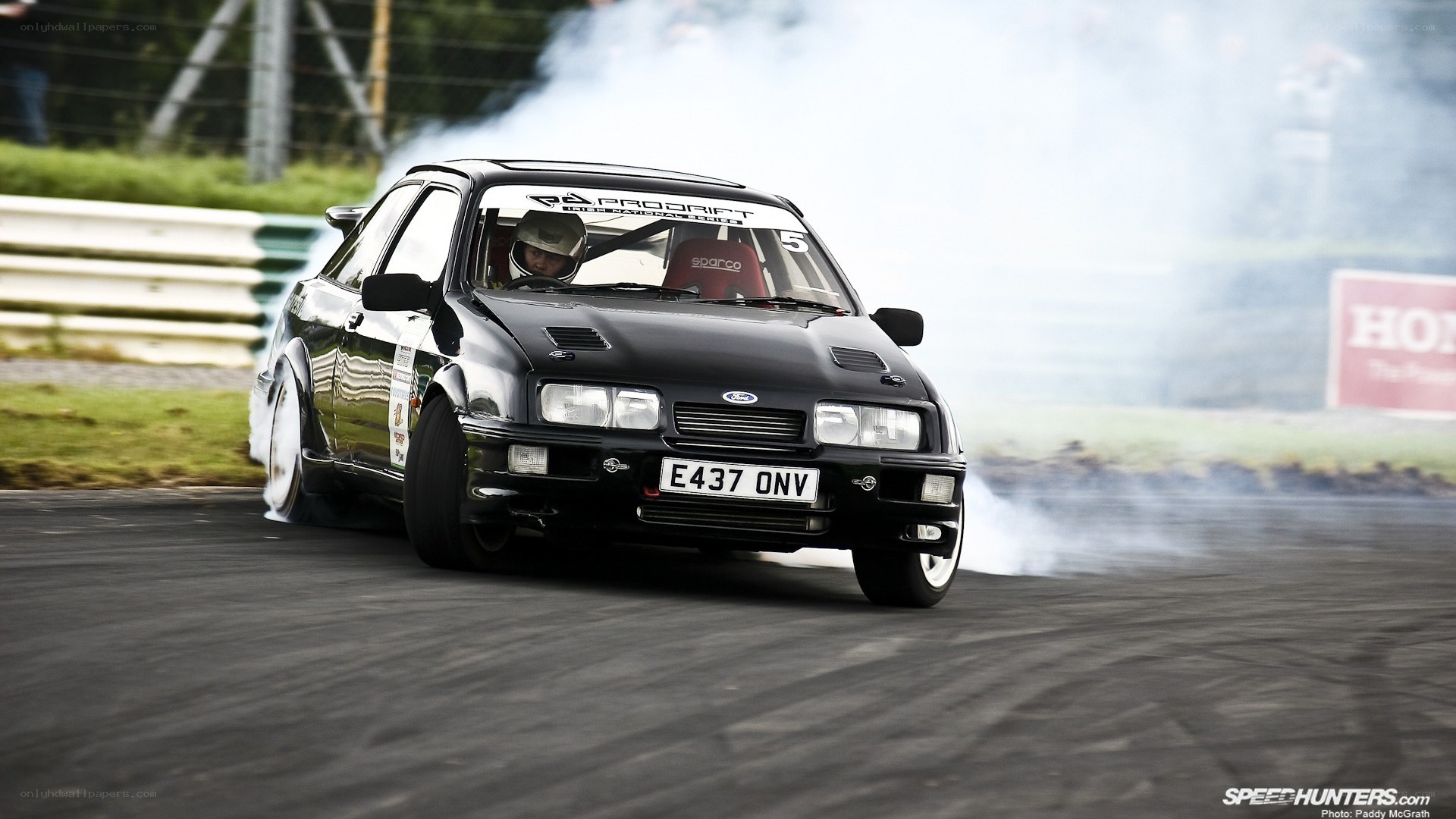 Black Ford Escort drifting