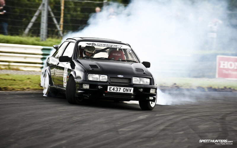 Black Ford Escort drifting