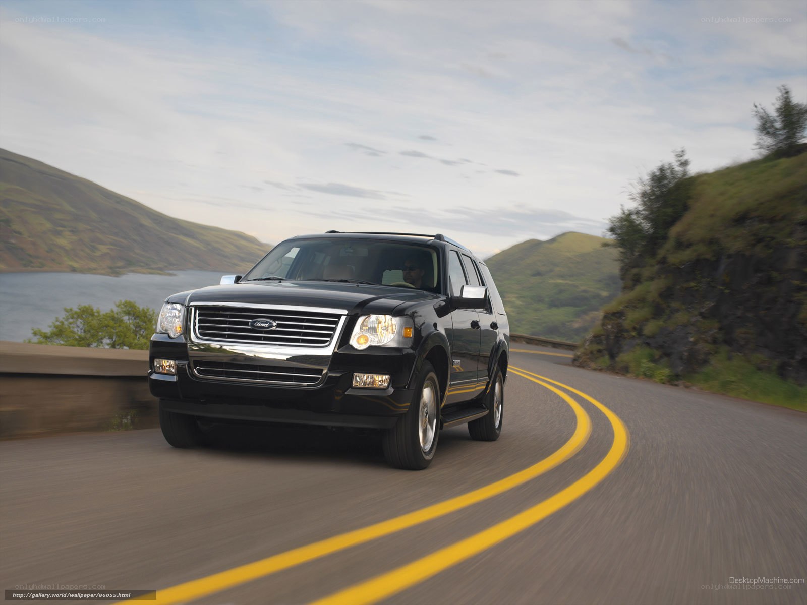 Black Ford Explorer on winding road