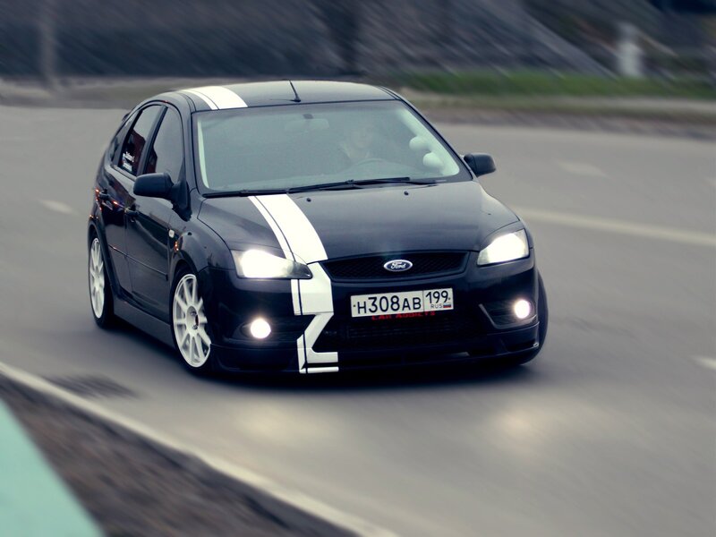 black ford focus on road