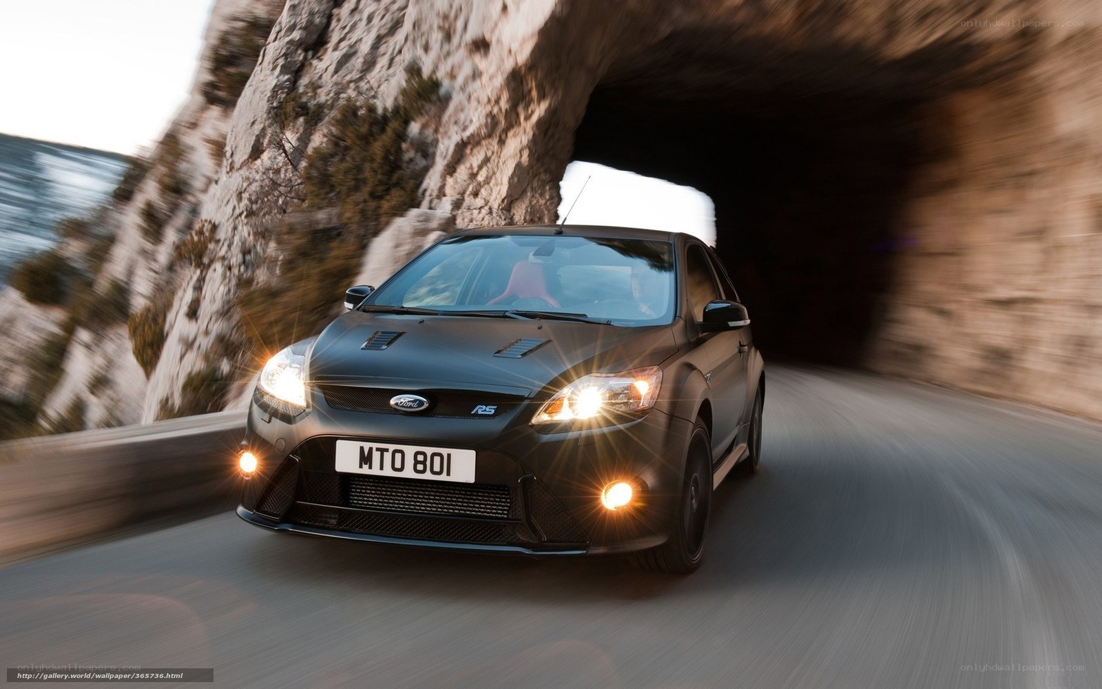 Black Ford Focus RS exiting tunnel