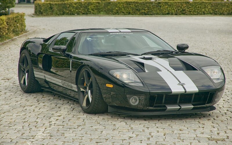 Black Ford GT Car — Calm, Afternoon, Photograph, Cobblestone, Hedge