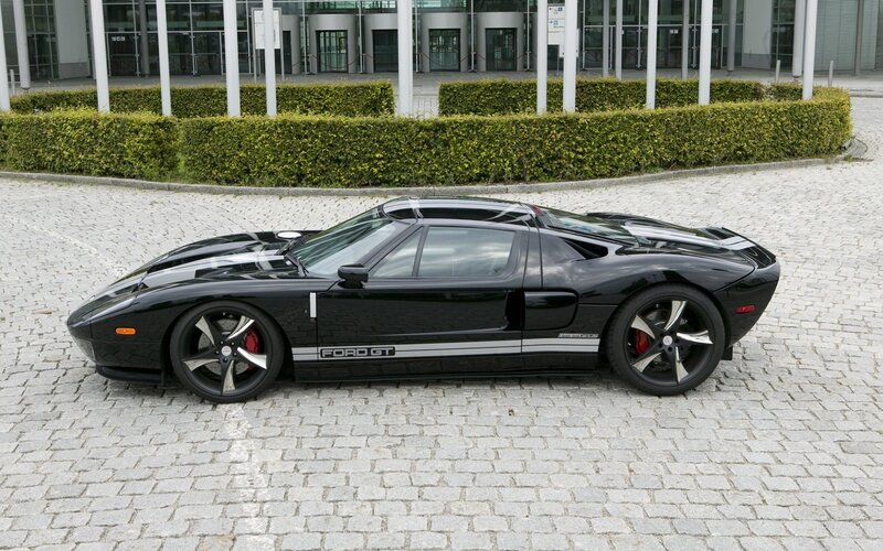 Black Ford GT Car — Calm, Afternoon, Photograph, Hedge