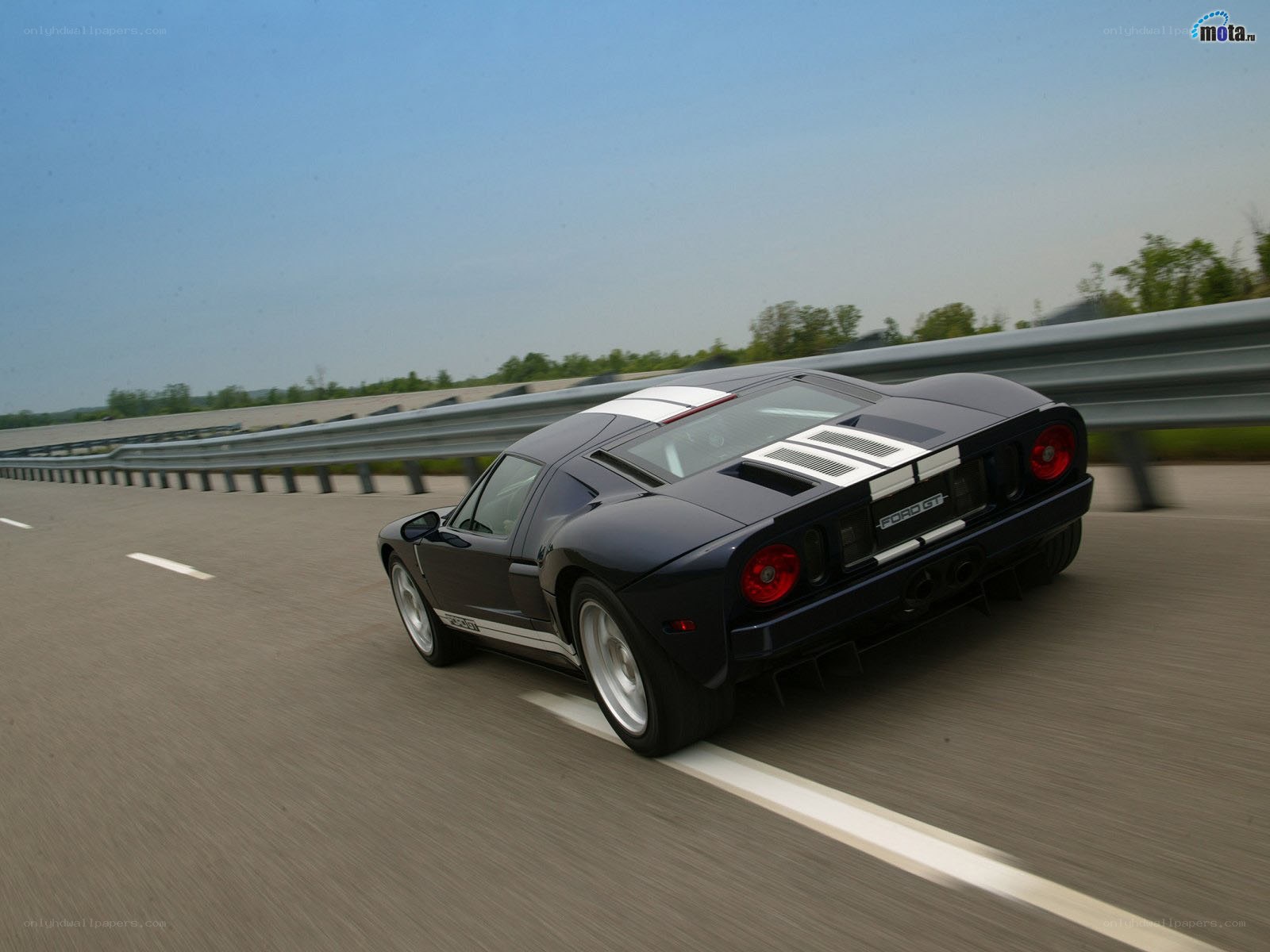 black ford gt on highway