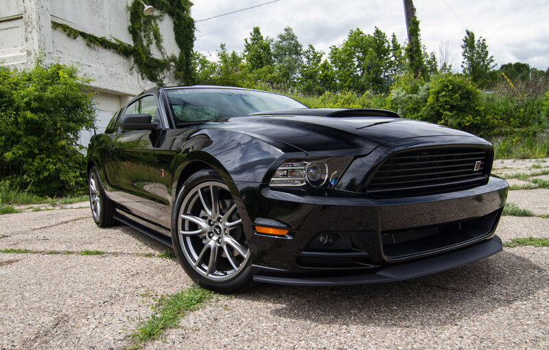 Black Ford Mustang — Calm, Afternoon, Photograph