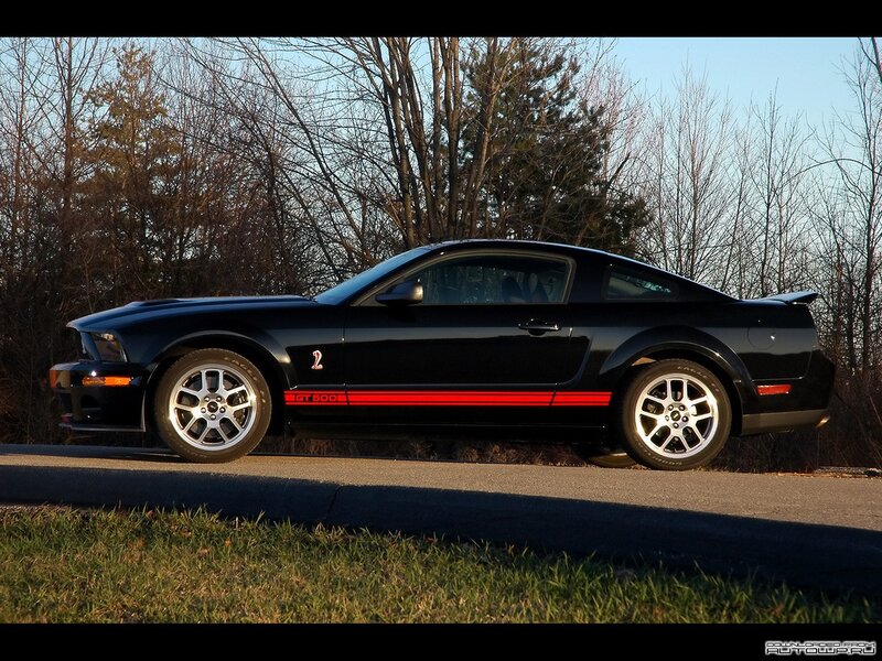 Black Ford Mustang GT — Dramatic, Sunset
