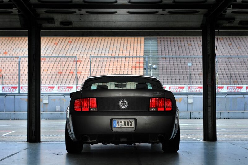Black Ford Mustang GT in garage