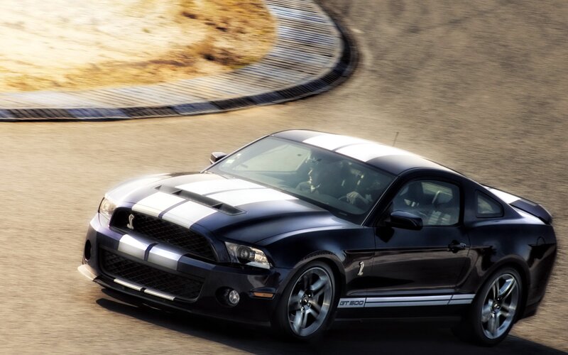 Black Ford Mustang GT500 on track