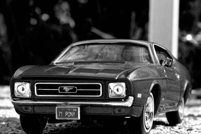 Black Ford Mustang Model — Dramatic