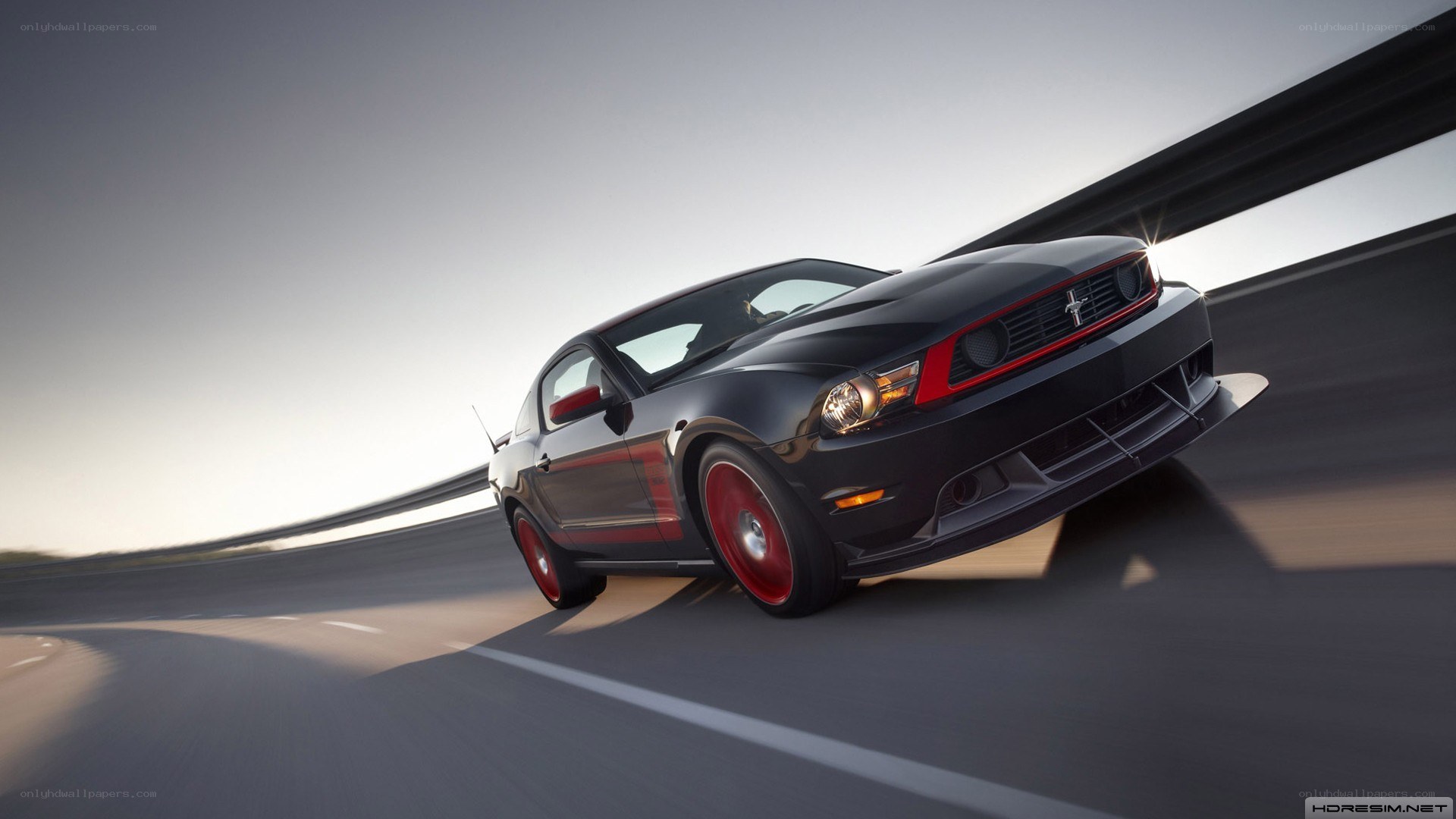 black ford mustang on highway
