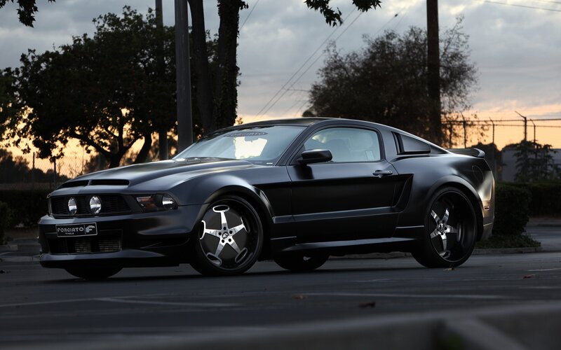Black Ford Mustang on street
