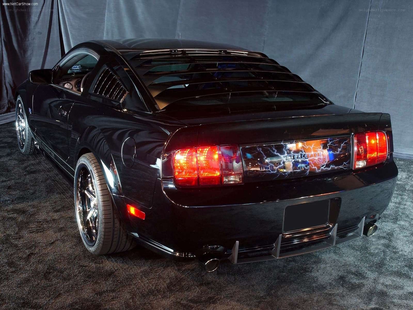 black ford mustang with custom rear